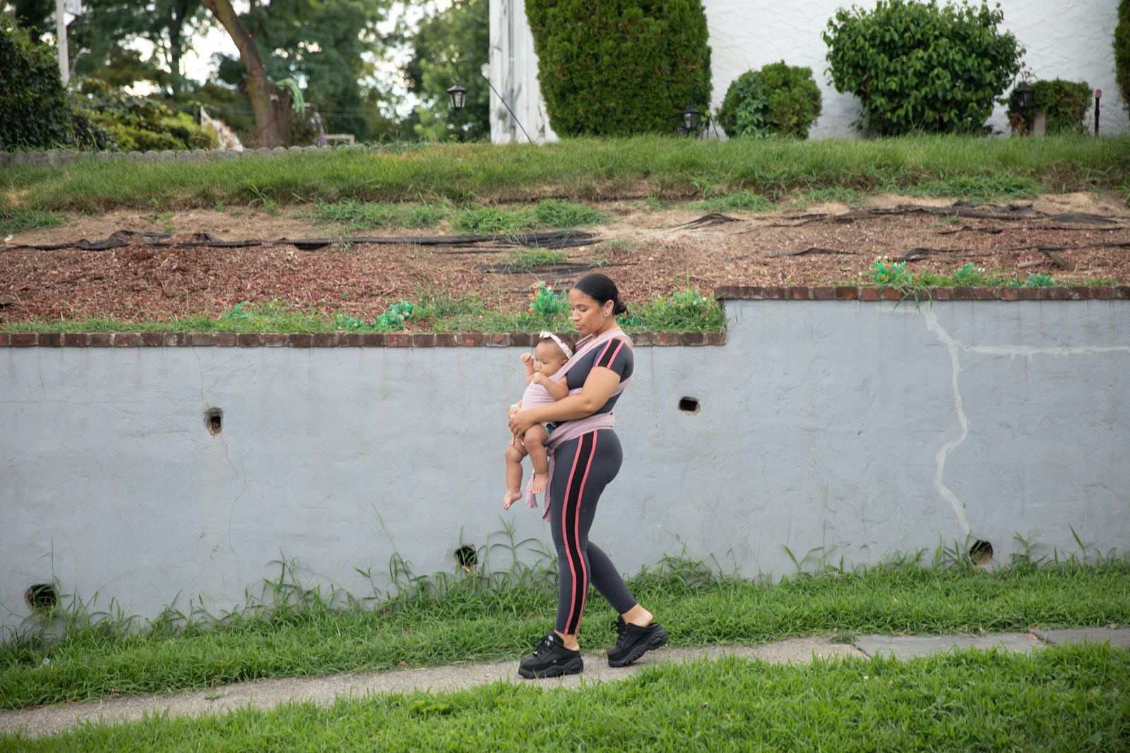 Discover Nashville's Hidden Gems: The 5 Best Places for Walks 2 a man holding a baby by a pond