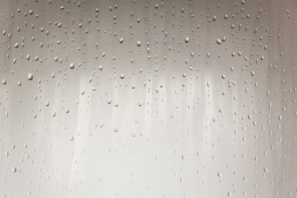 a close up of water droplets on a window