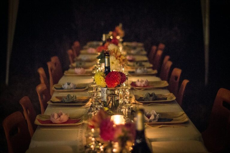 Creative Dinner Party Theme Ideas: Plans, Menus & Hosting Tips white and green ceramic plates on brown wooden dining table