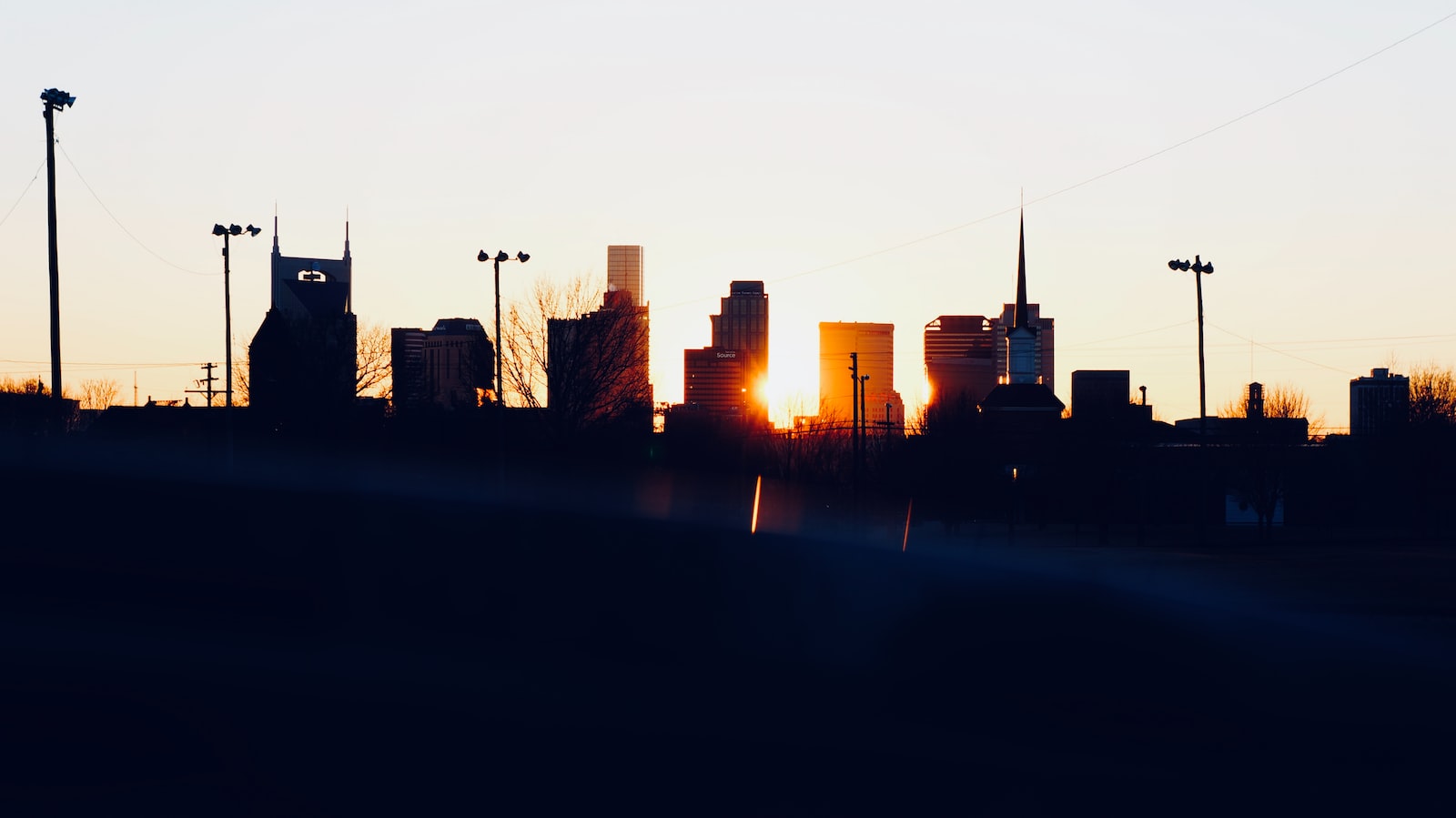5 Things About Nashville You Need To Know Before You Visit silhouette photo of city building during sunset