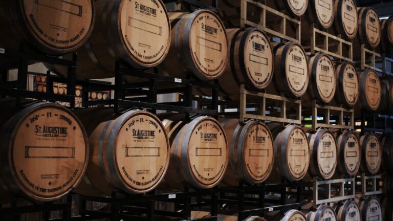 Louisville Bourbon Tastings: 19 Downtown Distilleries and Tasting Rooms brown wooden barrels on rack. bourbon. bourbon tastings. louisville