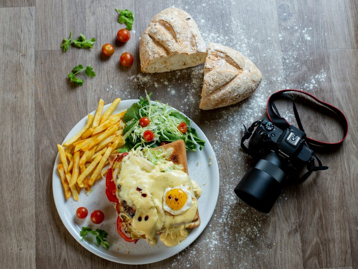 A hearty meal with fries, salad, and a sandwich. food blogs