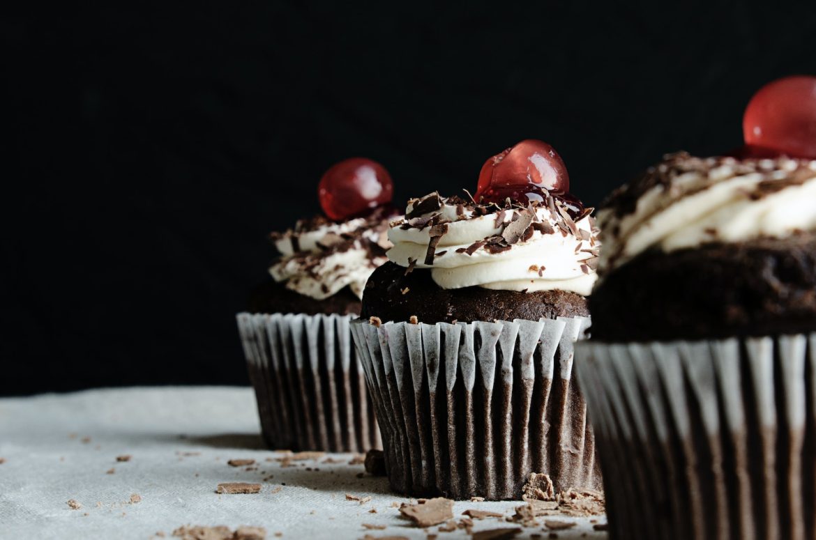 Nashville’s Black Owned Spots For The Best Sweet Treats And Snacks three chocolate cupcakes with cherries